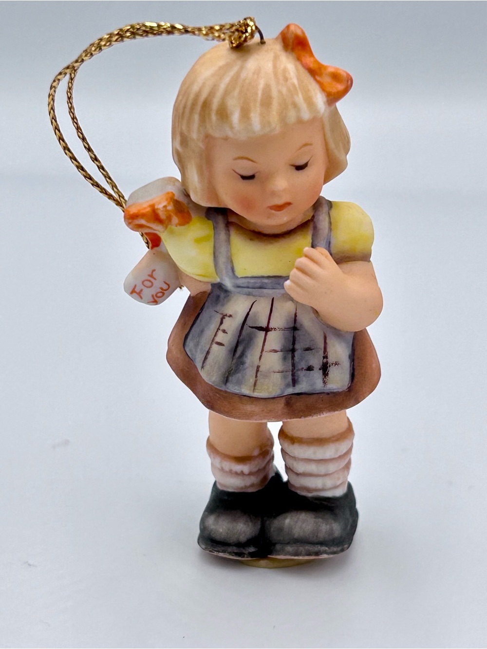 Vintage Porcelain Hummel Surprise For You" Christmas ornament.